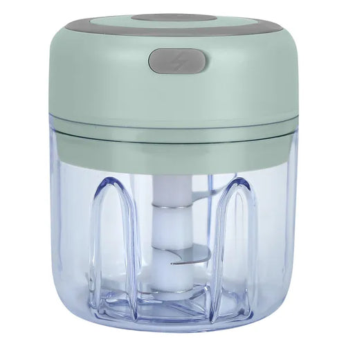 Handheld food chopper with green lid and clear container on a white background