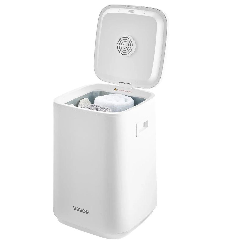 Heated towel bucket with warm rolled towels beside a luxury bathtub for a relaxing home spa experience.